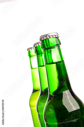 Three beer bottles on white
