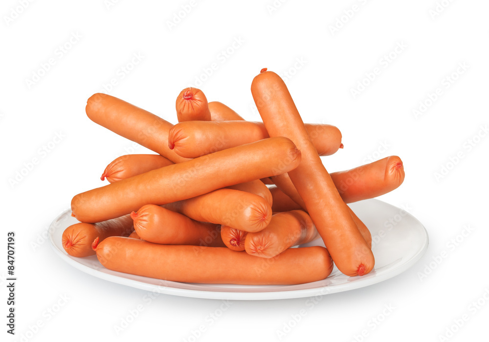 a large pile of sausages on a plate isolated on white background a large pile of sausages on a plate isolated on white background