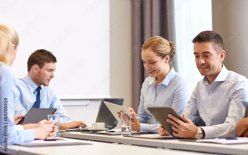 smiling business people with tablet pc in office smiling business people with tablet pc in office