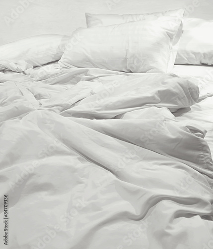 messy bed sheets photo