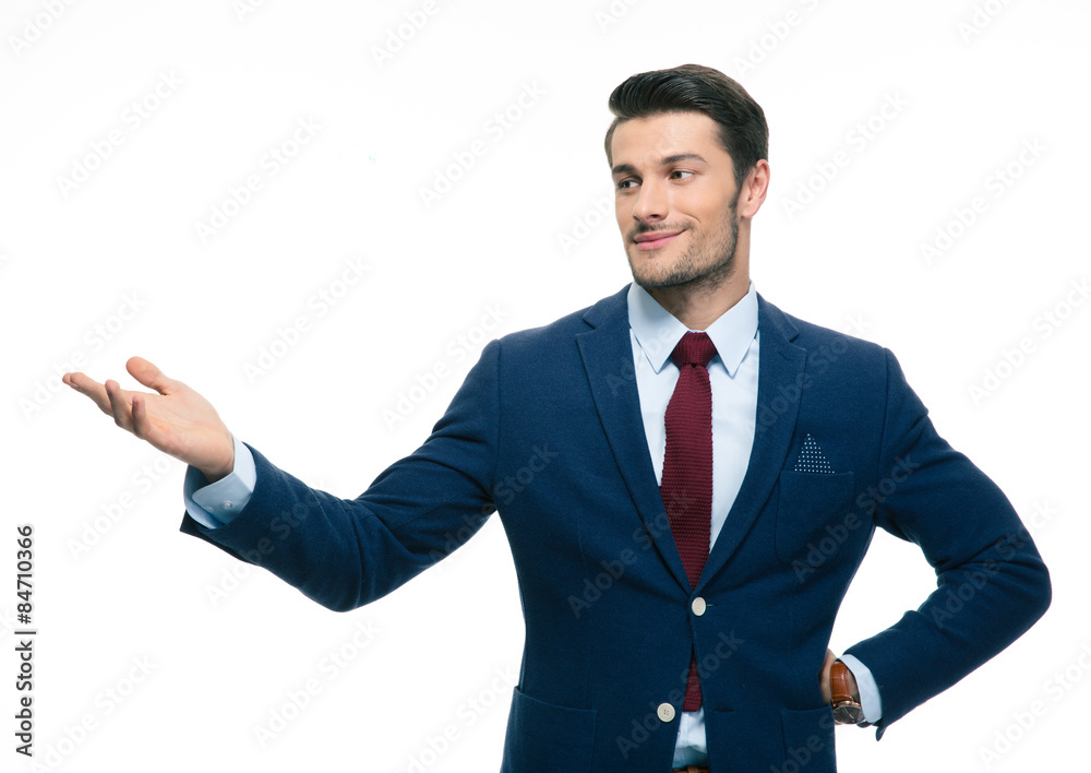 Happy businessman pointing away Happy businessman pointing away