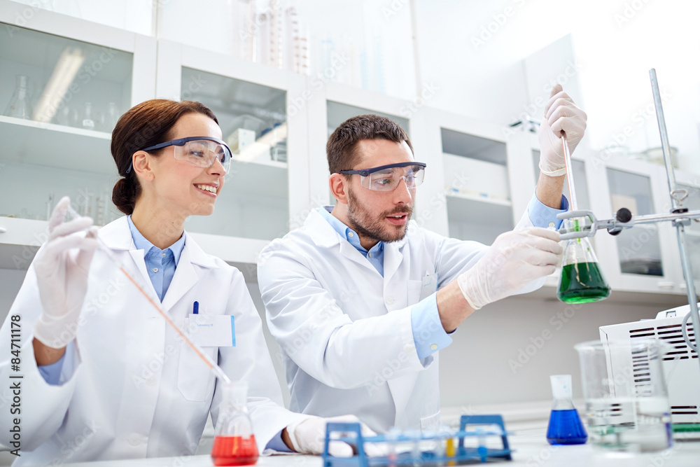 young scientists making test or research in lab young scientists making test or research in lab