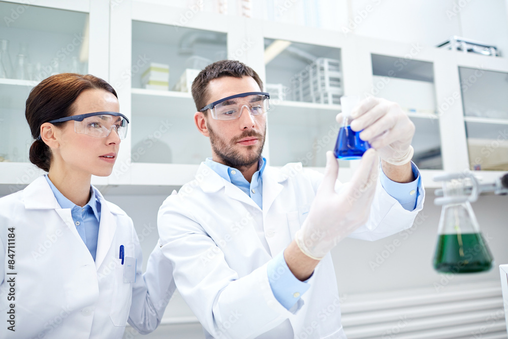 young scientists making test or research in lab