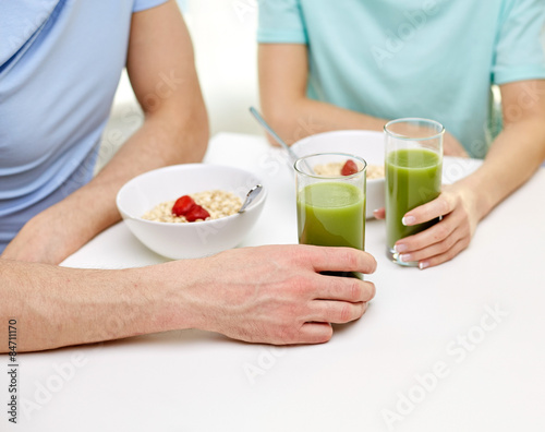 close up of couple having breakfast at home