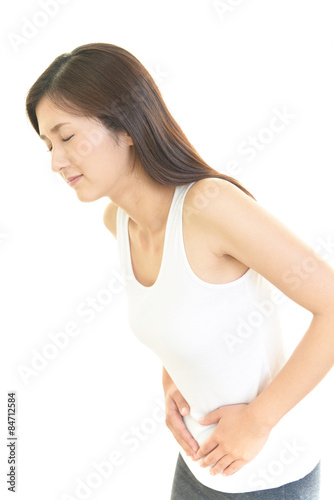 腹痛の女性