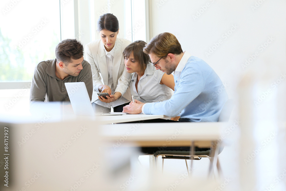 Business people meeting around table