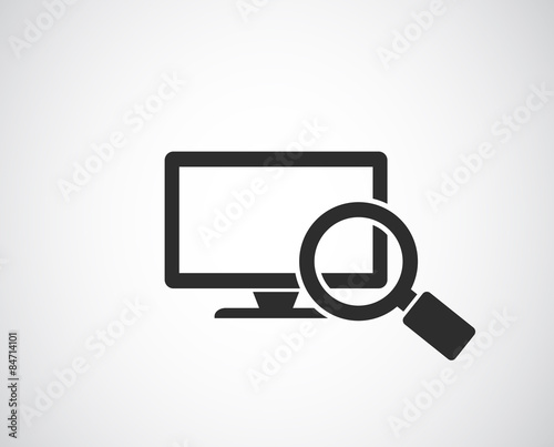 magnifying glass with computer monitor concept