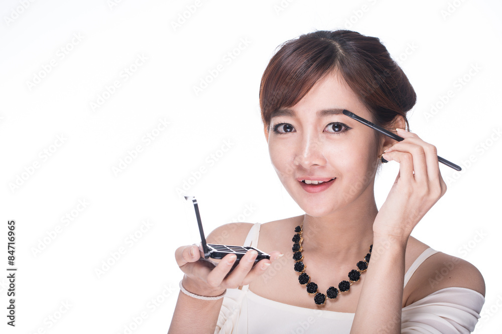 Makeup dry cosmetic tonal foundation on her face Makeup dry cosmetic tonal foundation on her face