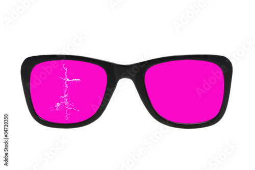 Fototapeta Naklejka Na Ścianę i Meble -  Cracked pink glasses in black frame.Isolated.