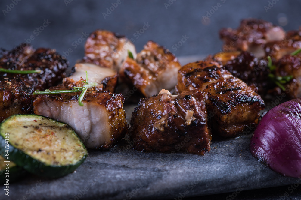 Close view on grilled crispy pork belly with sticky glaze Close view on grilled crispy pork belly with sticky glaze