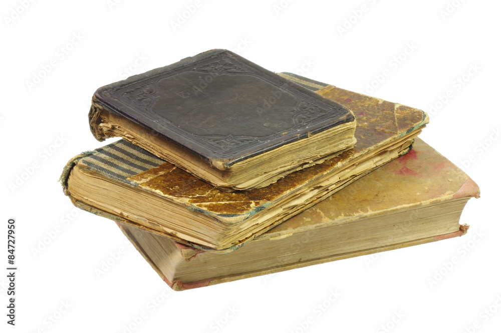 Nearly a century old books, hand bound by a bookbinder. On the white background, isolated. Nearly a century old books, hand bound by a bookbinder. On the white background, isolated.