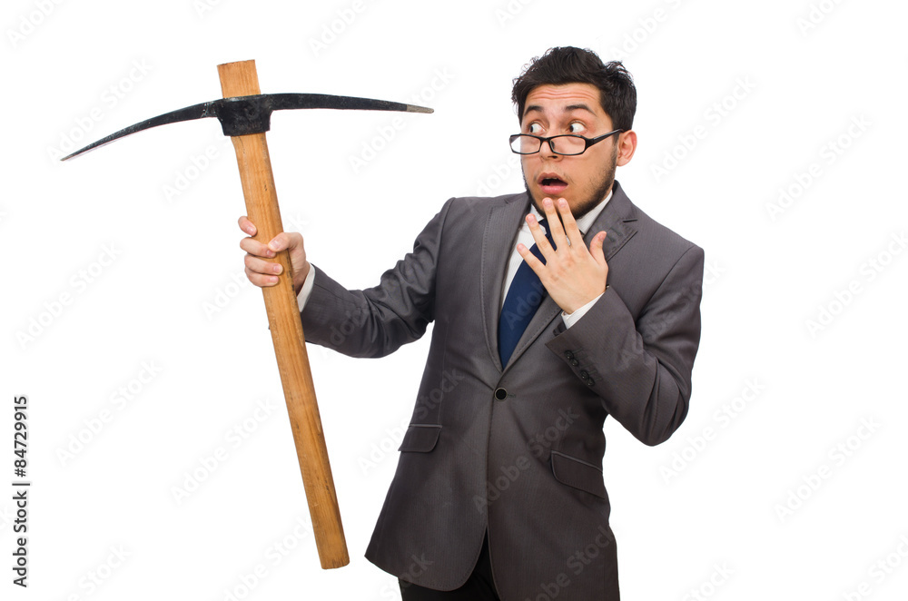 Young businessman holding a tool isolated on white Young businessman holding a tool isolated on white
