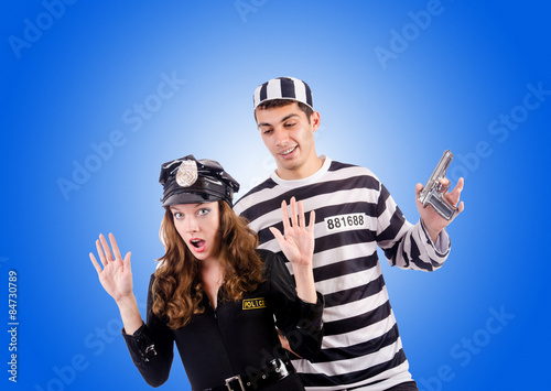 Konstfotografi Police and prison inmate on white
