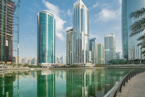 Tall skyscrapers in Dubai near water