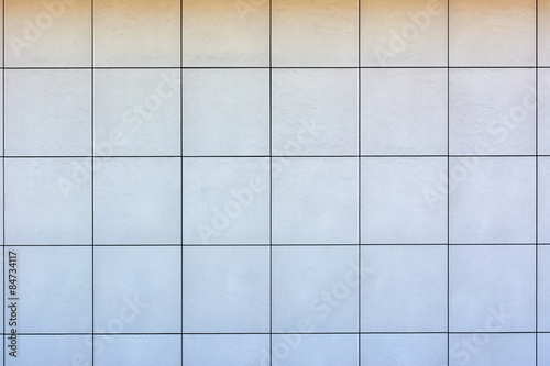 Floor tiles of the same pattern used for the background.