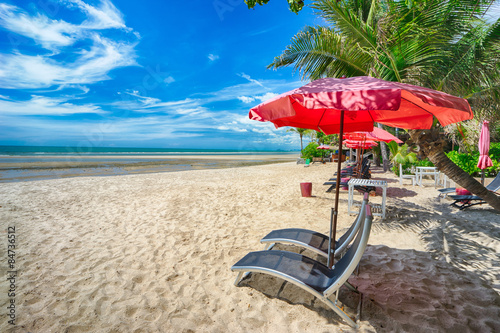 beautiful beach with empty benches