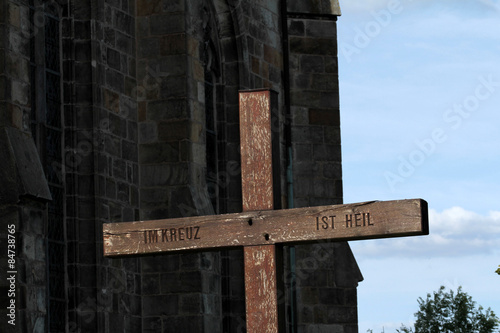 kreuz vor der sandebecker kirche photo