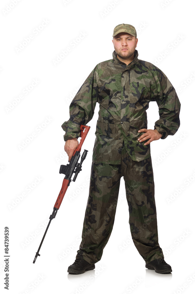 Young man in soldier uniform holding gun isolated on white Young man in soldier uniform holding gun isolated on white