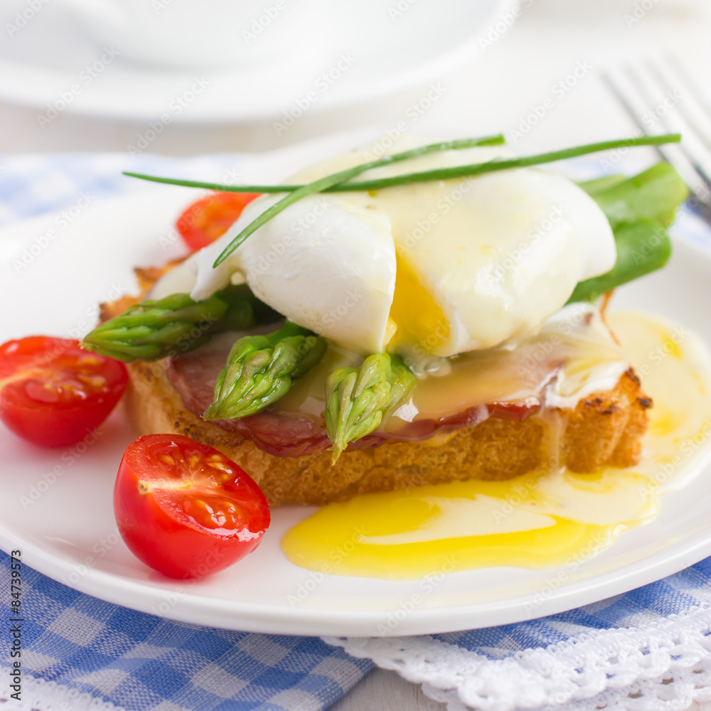Eggs Benedict with hollandaise sauce on toast with bacon and as Eggs Benedict with hollandaise sauce on toast with bacon and as