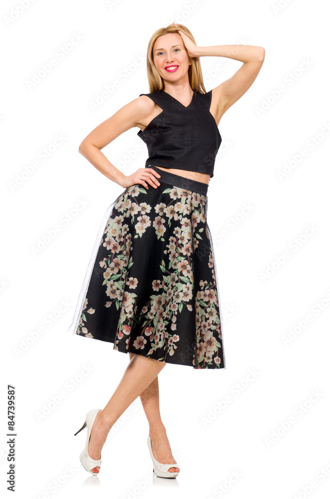 Woman in floral dark skirt isolated on white Woman in floral dark skirt isolated on white