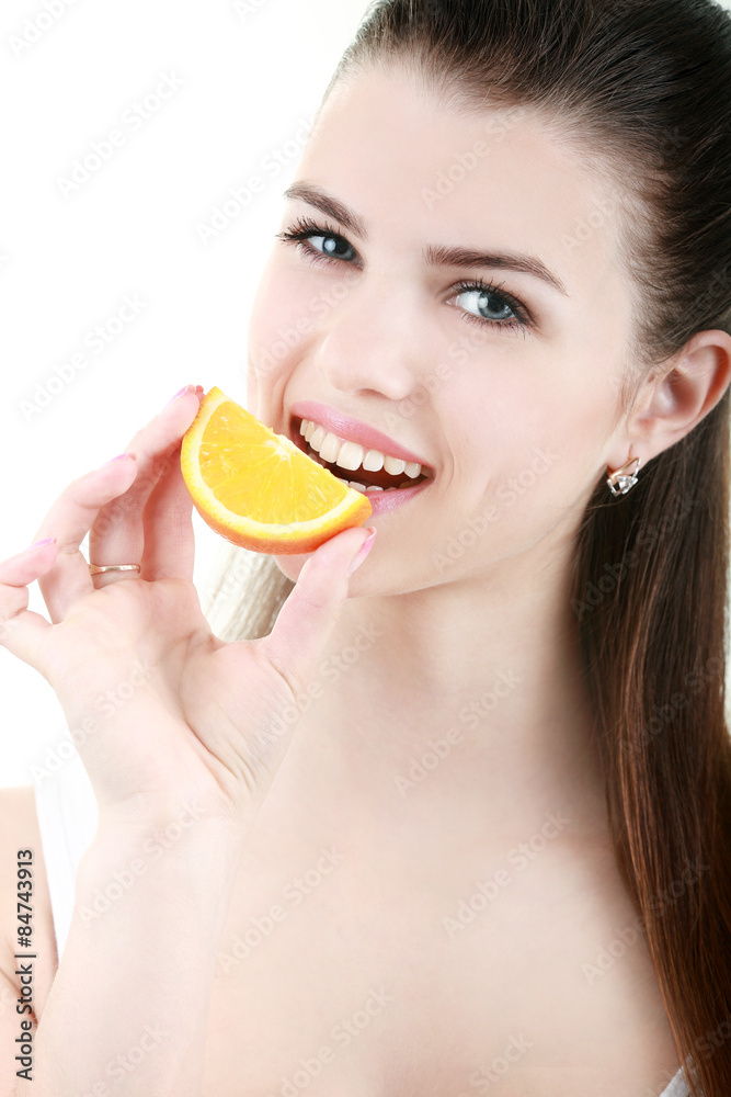 portrait of attractive caucasian smiling woman isolated on white studio shot eating orange
portrait of attractive caucasian smiling woman isolated on white studio shot eating orange