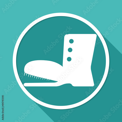 boots icon on white circle with a long shadow
