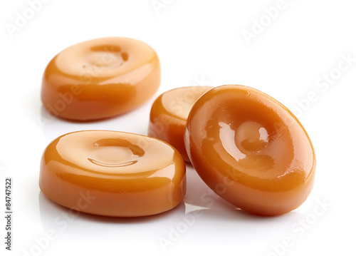 caramel candies isolated on white background