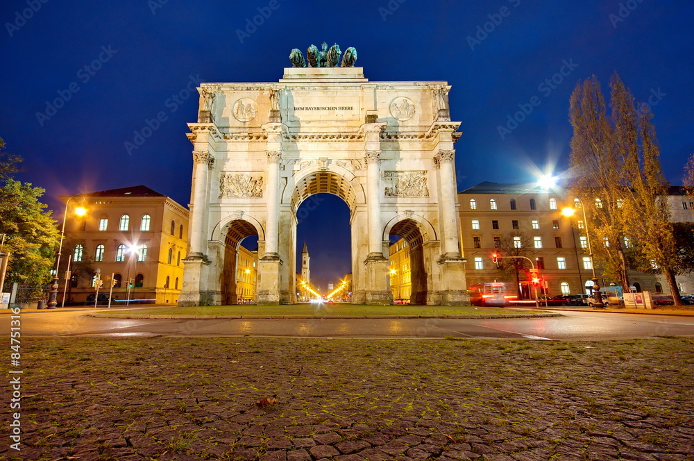 The Siegestor (Victory Gate) at night in Munich, Germany, Europe