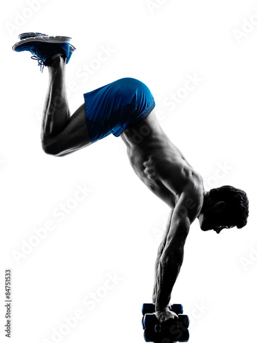 Fototapeta man exercising fitness crunches exercises silhouette 