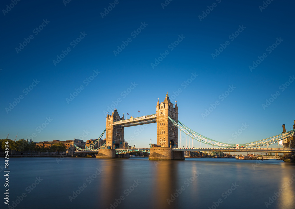 Tower Bridge in the sunset with clear blue sky, London, UK
