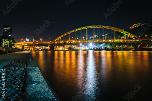 Fort Pitt Bridge at night, seen from Point State Park, in Pittsb