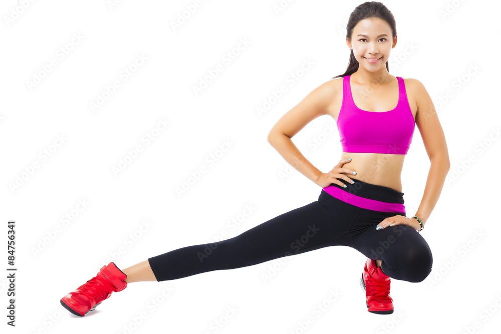 beautiful young woman stretching on the floor beautiful young woman stretching on the floor