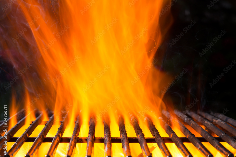 Empty grill grid with fire