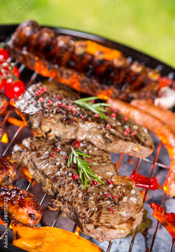Barbecue grill with various kinds of meat