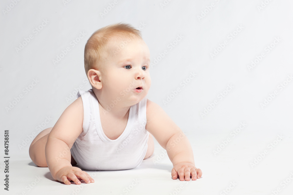 Cute baby lying in diaper on white background Cute baby lying in diaper on white background