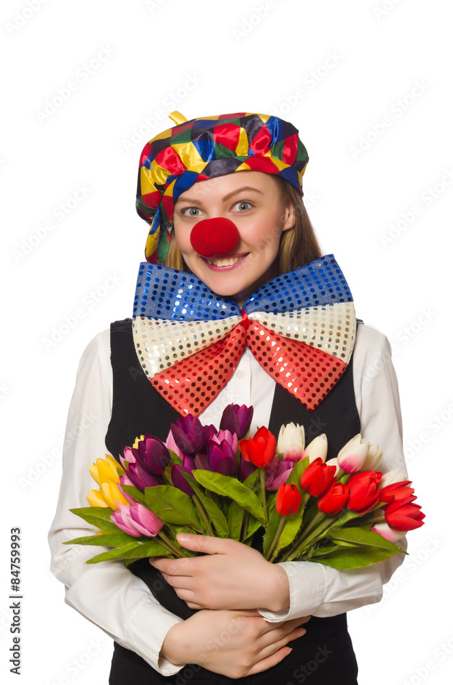 Pretty female clown with flowers isolated on white Pretty female clown with flowers isolated on white
