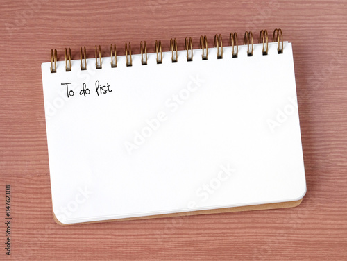 To do list on blank notebook background