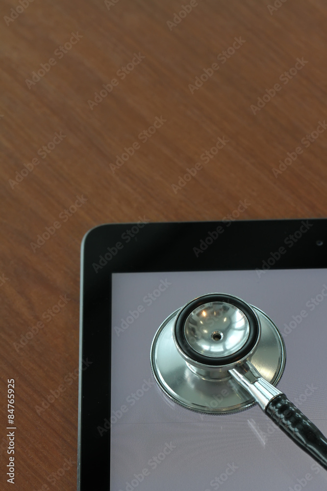 studio macro of a stethoscope and digital tablet on wood table b studio macro of a stethoscope and digital tablet on wood table b