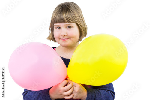 Young caucasian girl holding two balloons isolated on white background © benschonewille