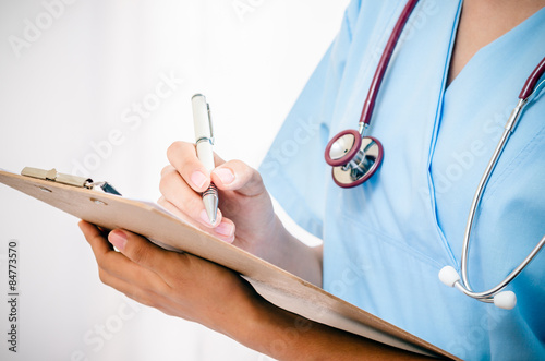 medical student train recording patient’s information 