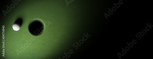 Obraz na plátně Golf ball on green turf banner