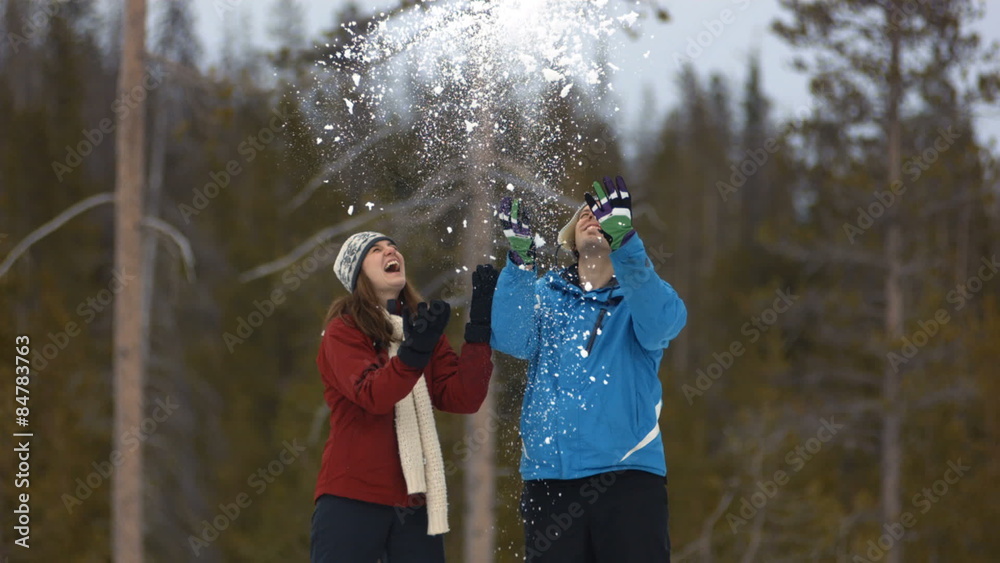 Couple playing with snow 