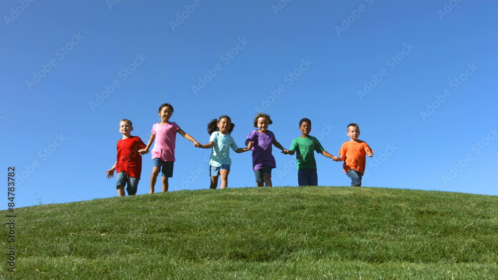 Portrait of children of various ethnicities on a hilltop Portrait of children of various ethnicities on a hilltop