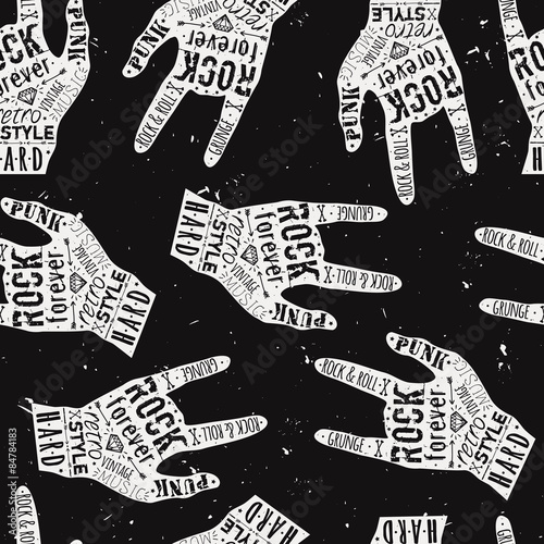 Vector seamless grunge pattern with vintage hand labels, diamonds, bones, arrows, stars and typography elements. Rock and roll style.