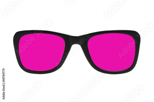 Pink glasses in black frame taken closeup.