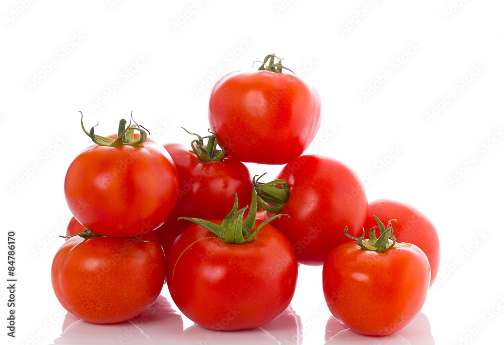 Fresh red tomatoes isolated over white background Fresh red tomatoes isolated over white background