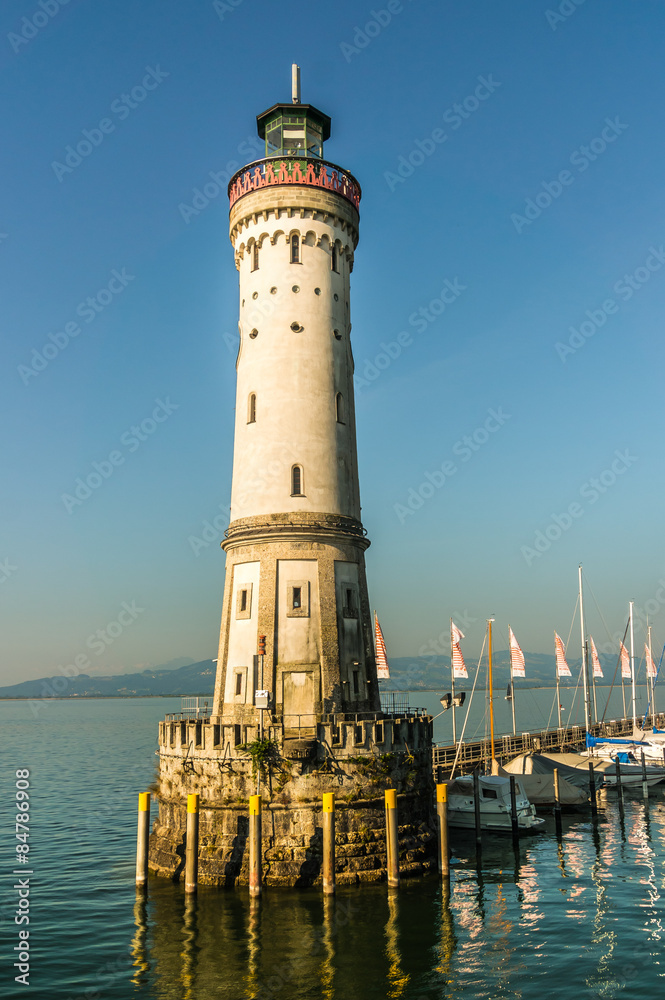 Lighthouse at morning in harbor of Lindau in lake Constance