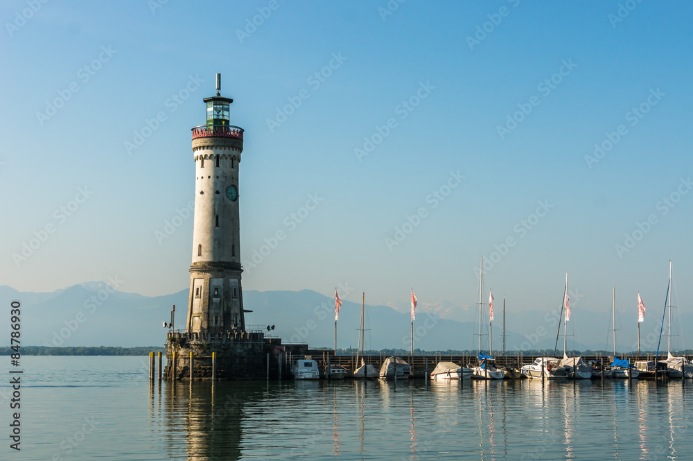 Harbor of Lindau at morning and lighthouse in lake Constance