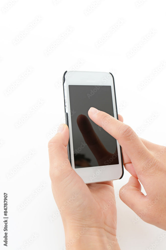 スマートフォンを操作する手 スマートフォンを操作する手