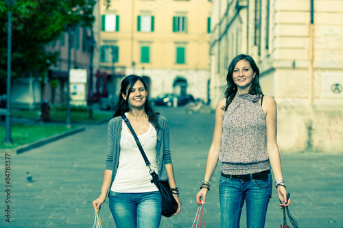 Couple of Women with Shopping Bags